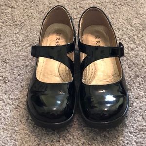 Shiny black Mary Jane style shoes